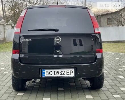 Черный Опель Мерива, объемом двигателя 1.8 л и пробегом 212 тыс. км за 4400 $, фото 2 на Automoto.ua