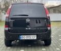 Черный Опель Мерива, объемом двигателя 1.8 л и пробегом 212 тыс. км за 4400 $, фото 2 на Automoto.ua