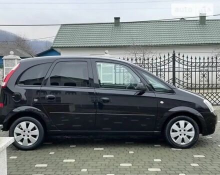 Черный Опель Мерива, объемом двигателя 1.8 л и пробегом 212 тыс. км за 4400 $, фото 1 на Automoto.ua