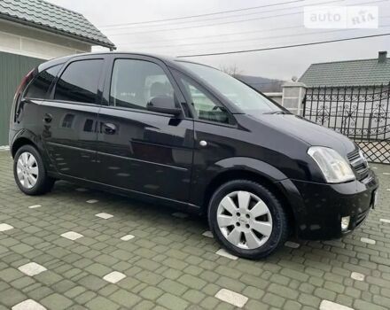 Черный Опель Мерива, объемом двигателя 1.8 л и пробегом 212 тыс. км за 4400 $, фото 4 на Automoto.ua