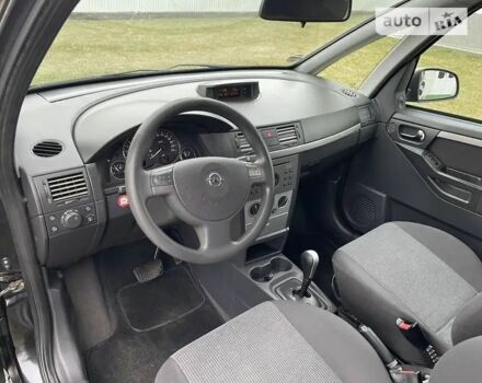 Черный Опель Мерива, объемом двигателя 1.8 л и пробегом 212 тыс. км за 4400 $, фото 5 на Automoto.ua