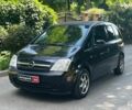 Чорний Опель Меріва, об'ємом двигуна 1.6 л та пробігом 230 тис. км за 4090 $, фото 1 на Automoto.ua
