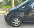 Черный Опель Мерива, объемом двигателя 1.6 л и пробегом 230 тыс. км за 3830 $, фото 2 на Automoto.ua