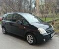 Чорний Опель Меріва, об'ємом двигуна 1.6 л та пробігом 242 тис. км за 3800 $, фото 1 на Automoto.ua
