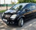 Чорний Опель Меріва, об'ємом двигуна 1.6 л та пробігом 310 тис. км за 3900 $, фото 1 на Automoto.ua