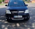 Чорний Опель Меріва, об'ємом двигуна 1.6 л та пробігом 310 тис. км за 3900 $, фото 1 на Automoto.ua