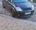 Черный Опель Мерива, объемом двигателя 1.6 л и пробегом 235 тыс. км за 3516 $, фото 1 на Automoto.ua