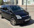 Черный Опель Мерива, объемом двигателя 1.6 л и пробегом 210 тыс. км за 3600 $, фото 1 на Automoto.ua