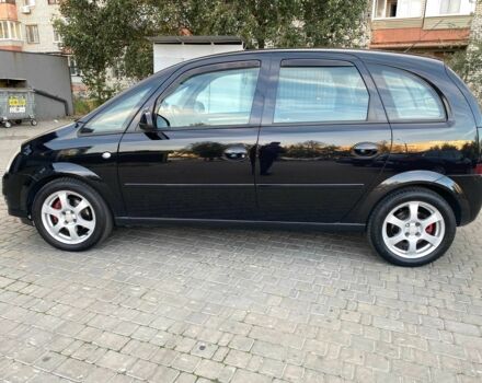 Черный Опель Мерива, объемом двигателя 1.8 л и пробегом 260 тыс. км за 5800 $, фото 2 на Automoto.ua