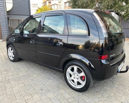 Черный Опель Мерива, объемом двигателя 1.8 л и пробегом 260 тыс. км за 5800 $, фото 4 на Automoto.ua