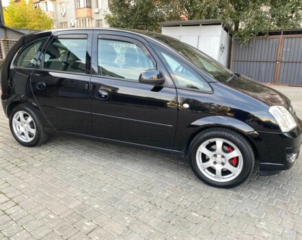 Черный Опель Мерива, объемом двигателя 1.8 л и пробегом 260 тыс. км за 5800 $, фото 6 на Automoto.ua