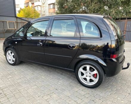 Черный Опель Мерива, объемом двигателя 1.8 л и пробегом 260 тыс. км за 5800 $, фото 3 на Automoto.ua