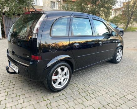 Черный Опель Мерива, объемом двигателя 1.8 л и пробегом 260 тыс. км за 5800 $, фото 9 на Automoto.ua