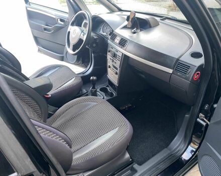 Черный Опель Мерива, объемом двигателя 1.8 л и пробегом 260 тыс. км за 5800 $, фото 12 на Automoto.ua