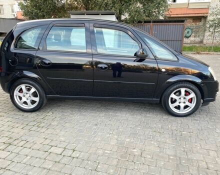 Черный Опель Мерива, объемом двигателя 1.8 л и пробегом 260 тыс. км за 5800 $, фото 7 на Automoto.ua