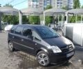 Черный Опель Мерива, объемом двигателя 1.6 л и пробегом 300 тыс. км за 3800 $, фото 1 на Automoto.ua