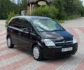 Черный Опель Мерива, объемом двигателя 1.6 л и пробегом 174 тыс. км за 3999 $, фото 1 на Automoto.ua