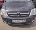 Черный Опель Мерива, объемом двигателя 1.6 л и пробегом 161 тыс. км за 3150 $, фото 1 на Automoto.ua