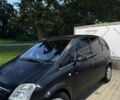 Черный Опель Мерива, объемом двигателя 1.7 л и пробегом 280 тыс. км за 4500 $, фото 1 на Automoto.ua