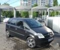 Черный Опель Мерива, объемом двигателя 1.6 л и пробегом 300 тыс. км за 3800 $, фото 1 на Automoto.ua
