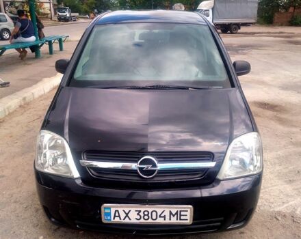 Черный Опель Мерива, объемом двигателя 1.7 л и пробегом 293 тыс. км за 4900 $, фото 2 на Automoto.ua