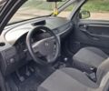 Черный Опель Мерива, объемом двигателя 1.7 л и пробегом 370 тыс. км за 3600 $, фото 10 на Automoto.ua