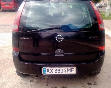 Черный Опель Мерива, объемом двигателя 1.7 л и пробегом 293 тыс. км за 4900 $, фото 1 на Automoto.ua
