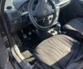 Черный Опель Мерива, объемом двигателя 1.4 л и пробегом 330 тыс. км за 3187 $, фото 1 на Automoto.ua