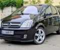 Черный Опель Мерива, объемом двигателя 1.8 л и пробегом 239 тыс. км за 4500 $, фото 1 на Automoto.ua