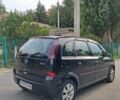 Черный Опель Мерива, объемом двигателя 1.7 л и пробегом 370 тыс. км за 3600 $, фото 4 на Automoto.ua