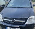 Черный Опель Мерива, объемом двигателя 0 л и пробегом 240 тыс. км за 1788 $, фото 1 на Automoto.ua