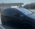 Черный Опель Мерива, объемом двигателя 1.8 л и пробегом 199 тыс. км за 4300 $, фото 1 на Automoto.ua
