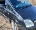 Черный Опель Мерива, объемом двигателя 1.4 л и пробегом 330 тыс. км за 3187 $, фото 4 на Automoto.ua