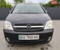 Черный Опель Мерива, объемом двигателя 1.4 л и пробегом 225 тыс. км за 3900 $, фото 1 на Automoto.ua