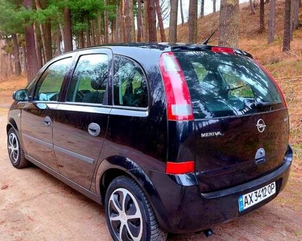 Черный Опель Мерива, объемом двигателя 1.7 л и пробегом 100 тыс. км за 4250 $, фото 9 на Automoto.ua