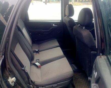 Черный Опель Мерива, объемом двигателя 1.7 л и пробегом 293 тыс. км за 4900 $, фото 6 на Automoto.ua