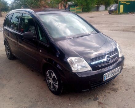 Черный Опель Мерива, объемом двигателя 1.7 л и пробегом 293 тыс. км за 4900 $, фото 3 на Automoto.ua