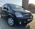 Черный Опель Мерива, объемом двигателя 1.6 л и пробегом 207 тыс. км за 4199 $, фото 5 на Automoto.ua
