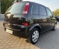 Черный Опель Мерива, объемом двигателя 1.6 л и пробегом 207 тыс. км за 4199 $, фото 8 на Automoto.ua