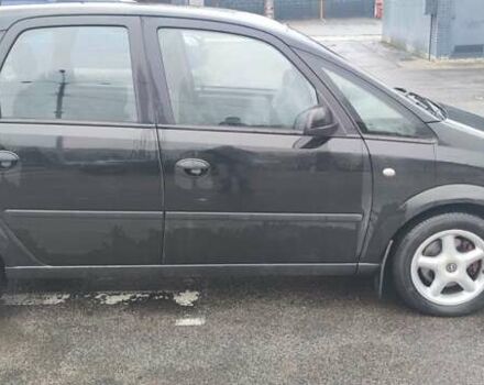 Черный Опель Мерива, объемом двигателя 1.6 л и пробегом 240 тыс. км за 3550 $, фото 4 на Automoto.ua