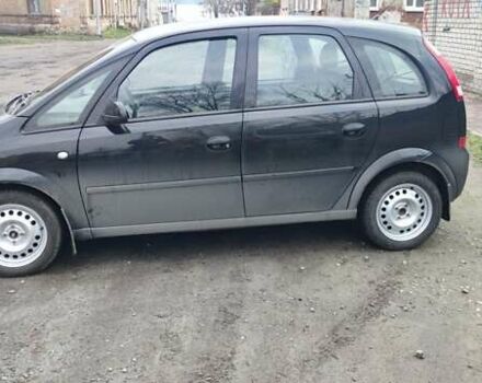 Черный Опель Мерива, объемом двигателя 1.6 л и пробегом 240 тыс. км за 3550 $, фото 5 на Automoto.ua