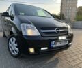 Черный Опель Мерива, объемом двигателя 1.6 л и пробегом 207 тыс. км за 4199 $, фото 23 на Automoto.ua