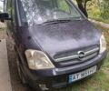 Черный Опель Мерива, объемом двигателя 1.6 л и пробегом 220 тыс. км за 4000 $, фото 1 на Automoto.ua