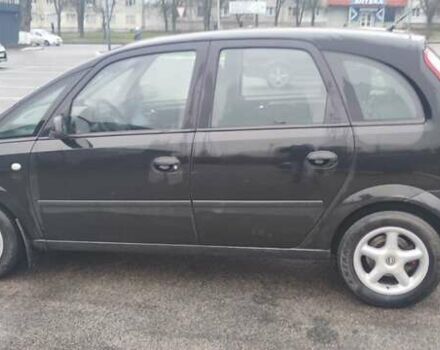 Черный Опель Мерива, объемом двигателя 1.6 л и пробегом 240 тыс. км за 3550 $, фото 1 на Automoto.ua