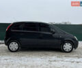Черный Опель Мерива, объемом двигателя 1.36 л и пробегом 250 тыс. км за 3600 $, фото 3 на Automoto.ua