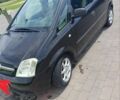 Черный Опель Мерива, объемом двигателя 1.6 л и пробегом 183 тыс. км за 3300 $, фото 1 на Automoto.ua