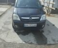 Черный Опель Мерива, объемом двигателя 1.4 л и пробегом 270 тыс. км за 4100 $, фото 2 на Automoto.ua