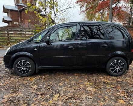 Черный Опель Мерива, объемом двигателя 1.6 л и пробегом 262 тыс. км за 4740 $, фото 14 на Automoto.ua