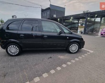 Черный Опель Мерива, объемом двигателя 1.6 л и пробегом 212 тыс. км за 4900 $, фото 7 на Automoto.ua