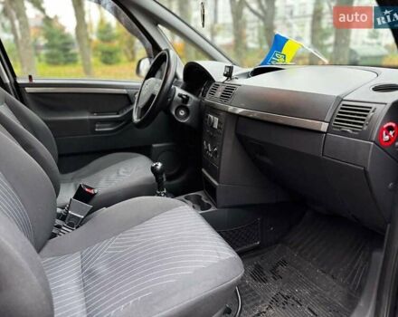 Черный Опель Мерива, объемом двигателя 1.6 л и пробегом 262 тыс. км за 4740 $, фото 29 на Automoto.ua